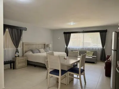 Cama o camas de una habitación en Loft a 6 minutos de la Playa