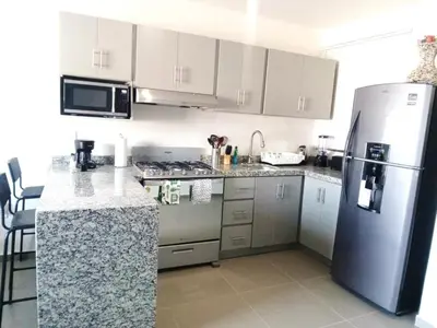 Una cocina o zona de cocina en Coto Mareta #2 Brisa Azul Alberca 1 Min Playa