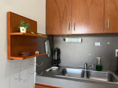 Una cocina o zona de cocina en Apartamento familiar a pocas calles de la playa