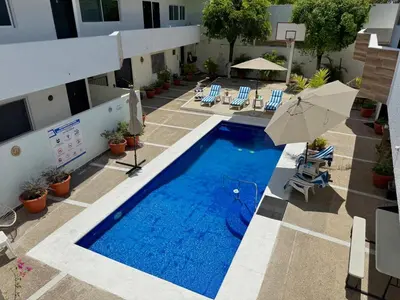 Piscina en o cerca de Precioso apartamento a pocas calles de la playa