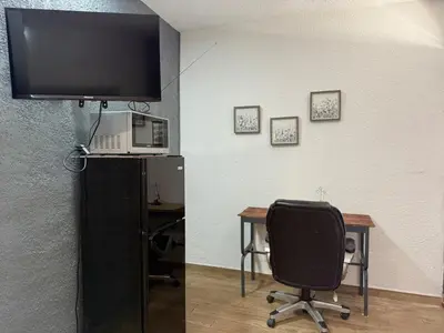 Una cocina o zona de cocina en Loft cerca de la playa y el malecón