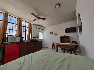Una televisión o centro de entretenimiento en Departamento en Centro Histórico HMO