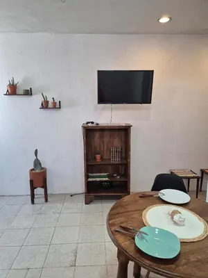 Una televisión o centro de entretenimiento en Departamento en Centro Histórico HMO
