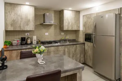 Una cocina o zona de cocina en Departamento Confort Colinas