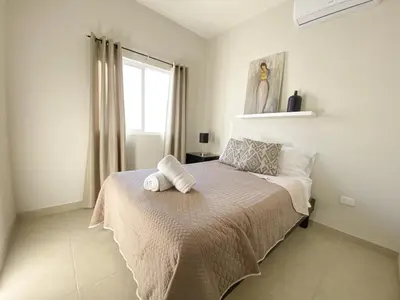 Cama o camas de una habitación en Casa Atardecer con Alberca en Privada, 5 min del Aeropuerto y Consulado Americano