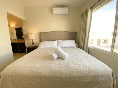 Cama o camas de una habitación en Casa Atardecer con Alberca en Privada, 5 min del Aeropuerto y Consulado Americano