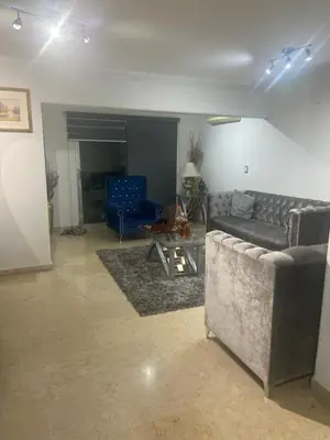 Zona de estar de Casa azul particular