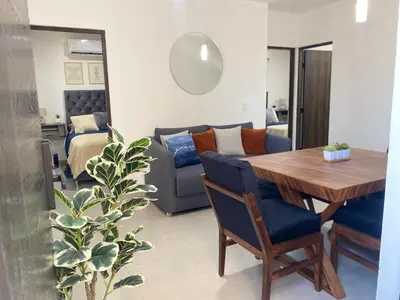 Zona de estar de Departamento arcangel residencial