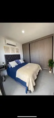 Cama o camas de una habitación en Departamento arcangel residencial