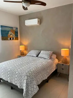 Cama o camas de una habitación en Condominio 406 Oceanna Mila