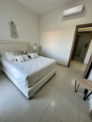 Cama o camas de una habitación en Relax with panoramic ocean and city views