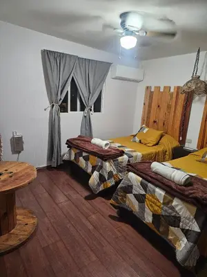 Cama o camas de una habitación en El DepaColonia Granjas on the Upper Floor
