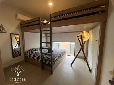 Cama o camas de una habitación en Condominio Frente al Mar