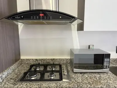 Una cocina o zona de cocina en Apartment Close to the Beach with Pool