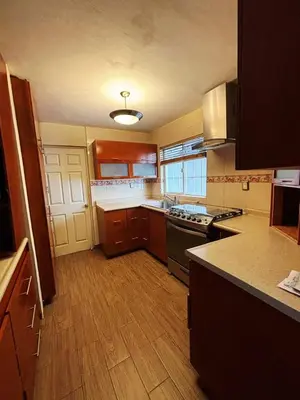 Una cocina o zona de cocina en Habitacion Maple