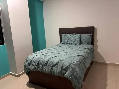 Cama o camas de una habitación en Alojamiento A Unas Calles del Malecon