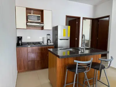 Una cocina o zona de cocina en Depa a unas Calles de la Playa By GPSRentas