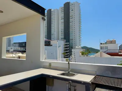 Un balcón o terraza de Depa a unas Calles de la Playa By GPSRentas