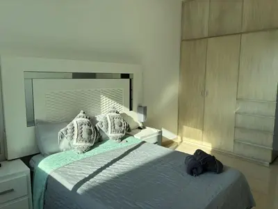 Cama o camas de una habitación en Departamento a unas Calles de la Zona Dorada