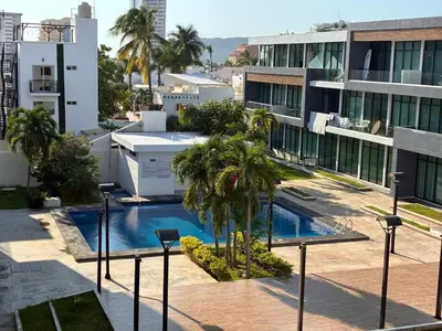 Piscina en o cerca de Departamento a unas Calles de la Zona Dorada