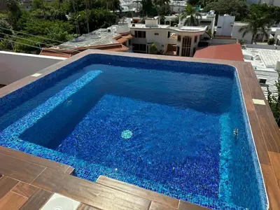 Piscina en o cerca de Depa A unas calles de la Playa y Zona Dorada ByGPS