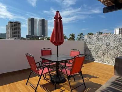 Un balcón o terraza de Depa A unas calles de la Playa y Zona Dorada ByGPS
