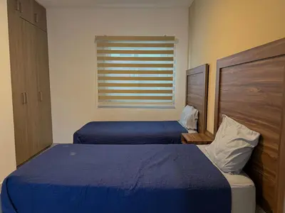 Cama o camas de una habitación en Depa en la Marina Mazatlan Familiar Cerca de la Playa