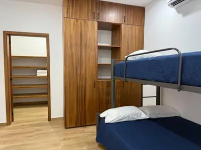Cama o camas de una habitación en Depa con terraza panoramica al mar y la ciudad