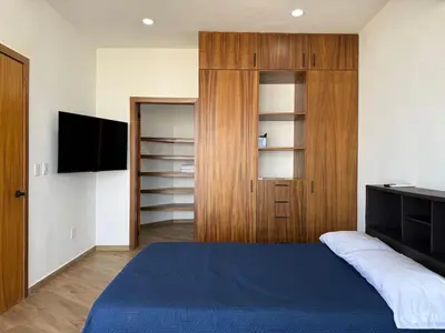 Cama o camas de una habitación en Depa con terraza panoramica al mar y la ciudad
