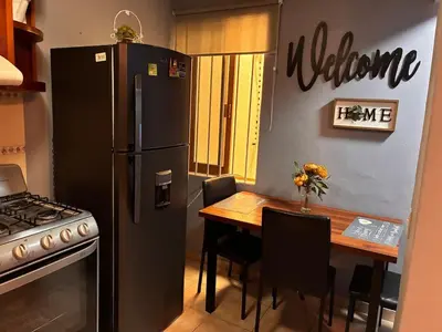Una cocina o zona de cocina en Depa en el Corazon de la Zona Dorada Y Playa