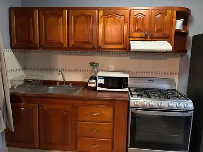 Una cocina o zona de cocina en Depa en el Corazon de la Zona Dorada Y Playa
