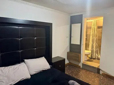 Cama o camas de una habitación en SUITE 6, Centro de Cuauhtémoc Chihuahua