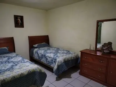 Cama o camas de una habitación en Casa entera cerca del Centro Histórico de Durango