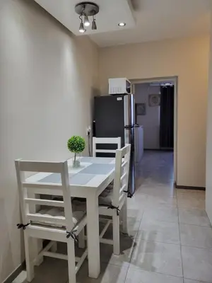 Una cocina o zona de cocina en Departamento Independiente y Acogedor