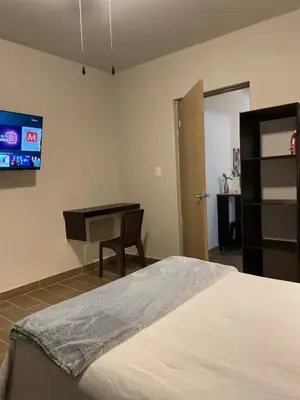 Una televisión o centro de entretenimiento en LiV109 Norte Depa 7 Cd Obregon