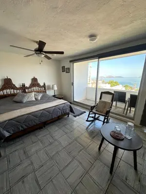 Cama o camas de una habitación en Villa Centenario
