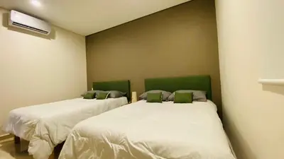 Cama o camas de una habitación en ELEVE – Lujo frente al mar en la mejor ubicación de Mazatlán