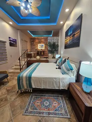 Cama o camas de una habitación en Casa Flor del Desierto