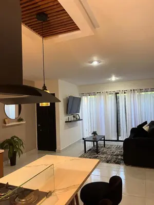 Una televisión o centro de entretenimiento en New ground floor apartment, very comfortable and excellent location