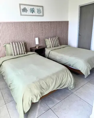 Cama o camas de una habitación en Marina Mazatlán Getaway, Terraza & Comodidad