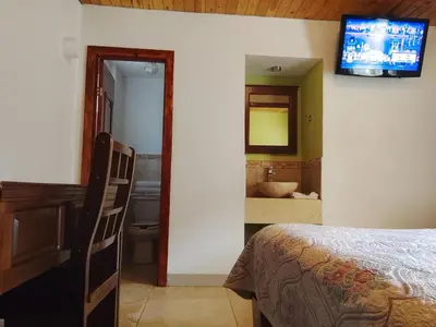 Cama o camas de una habitación en Hotel Ecológico Temazcal