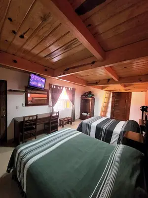 Cama o camas de una habitación en Hotel Ecológico Temazcal