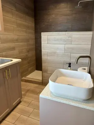Un baño de Lina Élite Suites