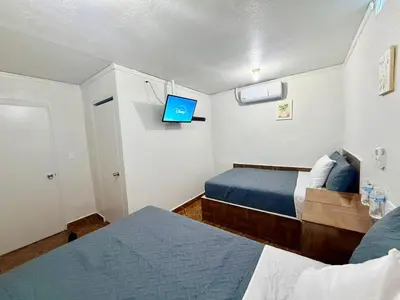 Cama o camas de una habitación en Comod Inn