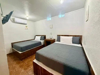 Cama o camas de una habitación en Comod Inn