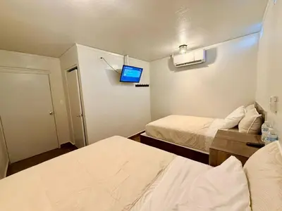 Cama o camas de una habitación en Comod Inn