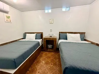 Cama o camas de una habitación en Comod Inn