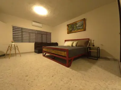 Cama o camas de una habitación en Habitación ejecutiva incluye servicios