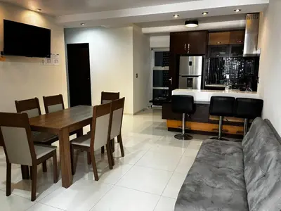 Una cocina o zona de cocina en Depa Frente al Parque Central, Excelente Ubicacion