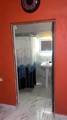 Un baño de Hospedajes Evelin